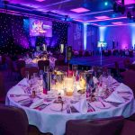 A close up of a table laid ready for guests